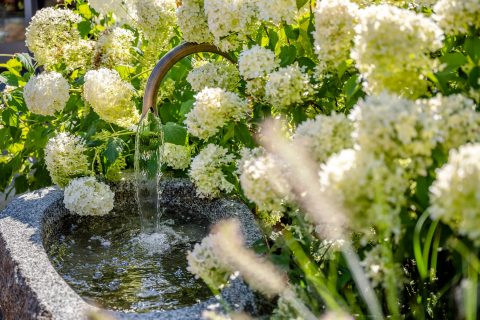Gartenbrunnen mit Wasser Relais Chalet Wilhelmy